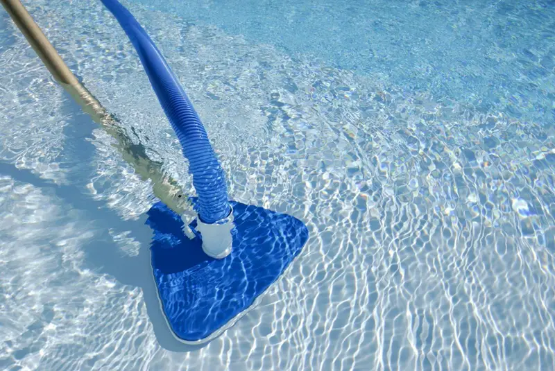 Pool vacuum cleaning a swimming pool floor Aquafun Sheffield