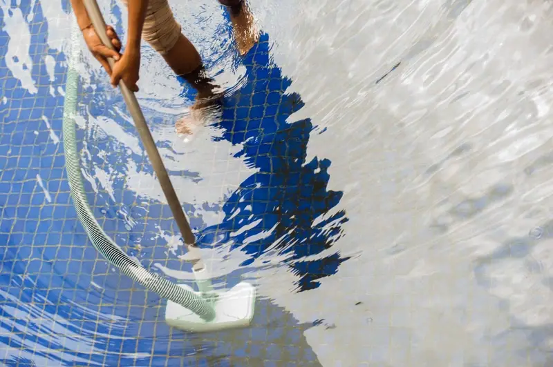 Swimming pool being cleaned during a maintenance visit Aquafun Sheffield
